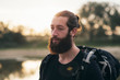© ysbrandcosijn - Backpacker with beard outdoors