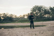 © ysbrandcosijn - Hiker in nature having fun with smartphone