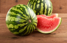Water Melon On A Wooden Background