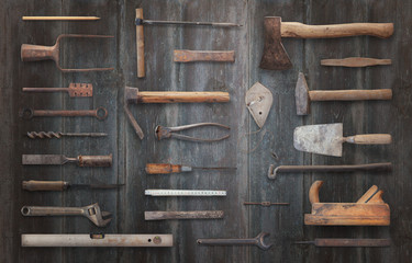 Old tools on wooden table. Traditional handmade tools for craftsmen.