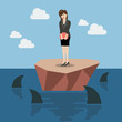 © siraanamwong - Helpless business woman on a small island which surrounded by sh