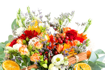 a bouquet of flowers with orange slices and cinnamon, floral bac