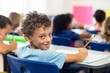 © WavebreakMediaMicro - Smiling boy with classmates in classroom