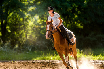 Girl riding a horse