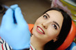 © Evgeniy Kalinovskiy - beautiful girl at the dentist. Dental fillings