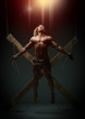 © kazanovskyiphoto - Sexual naked man, muscular, hands tied rope to wooden beams
