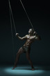 © kazanovskyiphoto - Young naked man, muscular body, bounded with rope