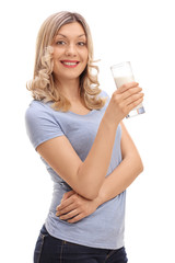 Poster - Joyful woman holding a glass of milk