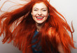 © Raisa Kanareva - woman with long flowing red hair