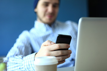 businessman using internet on smart phone and laptop