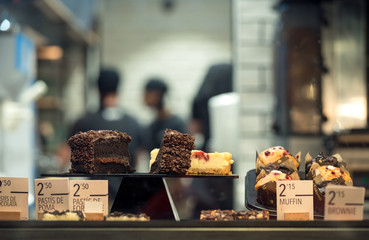 Cakes On Display In Cafe Close Up