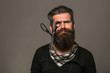 © Volodymyr - bearded man with hairdresser scissors