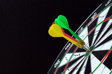 Three darts hits on dartboard target