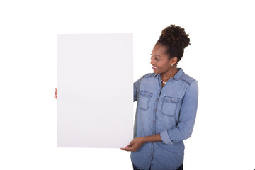 Young woman holding a poster board 