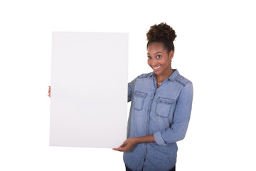 Young woman holding a poster board 