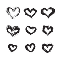 Hand drawn ink heart symbol set. Abstract vector black textured brush heart shape isolated on white background.