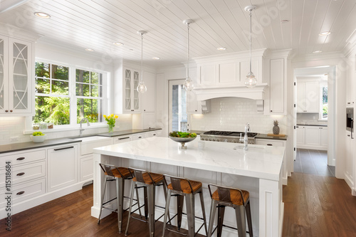 Beautiful White Kitchen In New Luxury Home With Lights On This Beautiful White Kitchen In New Luxury Home With Lights On