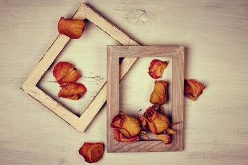 Wall Mural - Wooden photo frames with dry roses