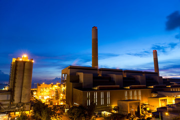 Wall Mural - Cement factory at sunset