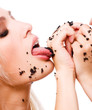 Woman eat black caviar