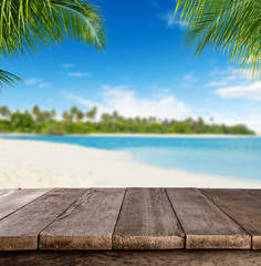 Wall Mural - Empty wooden planks with blur beach on background