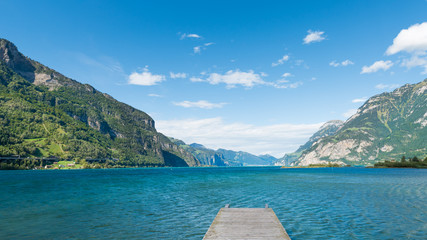 Sticker - Uri. Mountain range of the Alps. Foehn wind over the lake.  Grandiose volumetric  panorama.