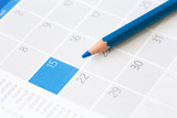 Fototapeta  - Pastello azzurro su calendario