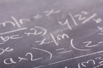 Close up of blackboard with maths equations