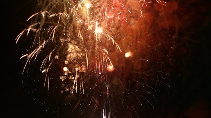 Wall Mural - fireworks finale over dark background