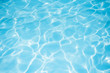 © peangdao - Ripple blue water surface with sun reflection in swimming pool