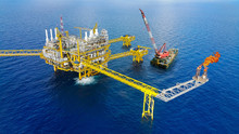 Offshore Construction Platform For Production Oil And Gas, Oil And Gas Industry And Hard Work,Production Platform And Operation Process By Manual And Auto Function, Oil And Rig Industry And Operation.