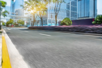 Poster - empty road front of modern buildings