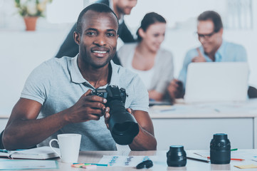 Poster - Confident photographer.