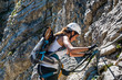 © XtravaganT - Fit athletic woman mountaineering