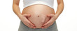 © Syda Productions - close up of pregnant woman touching her bare tummy