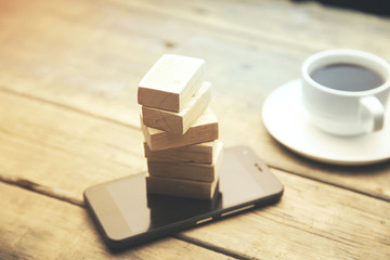 Canvas Print - Blocks of wood on phone