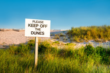 Beach Sign Warning To Please Keep Off The Dunes