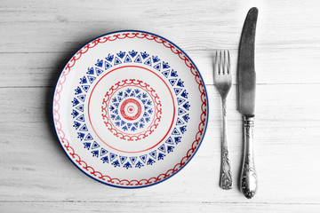 Sticker - Set of dinnerware on wooden table