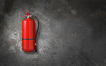 Fire Extinguisher On Gray Wall