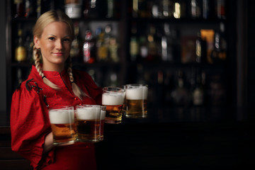 Wall Mural - Oktoberfest woman with beer