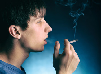 Poster - Young Man smoke a Cigarette