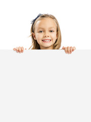 Wall Mural - Cute Girl holding a whiteboard