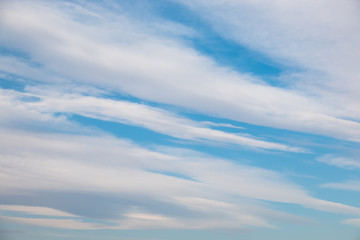 Wall Mural - abstract background with bokeh defocused beautiful flame clouds in the sky