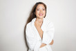 © Anetta - beautiful young asian woman with flawless skin and long hair posing in bath robe