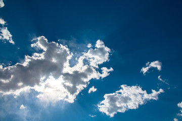 Wall Mural - abstract background with bokeh defocused beautiful flame clouds in the sky