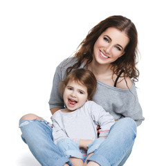 beautiful young mother with little daughter