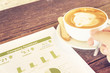 Drinking coffee latte reading company business factsheet statist