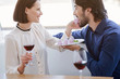 © Yakobchuk Olena - Pretty loving couple enjoying sweet food