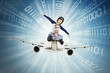 © Creativa Images - Boy riding airplane inside binary code