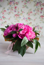 Pink Peonies On Wooden Background